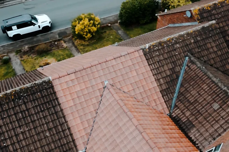 Completed red tiled roof photographed from above
