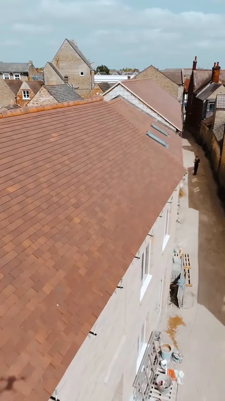 Marley clay peg tiles going on in St Neots