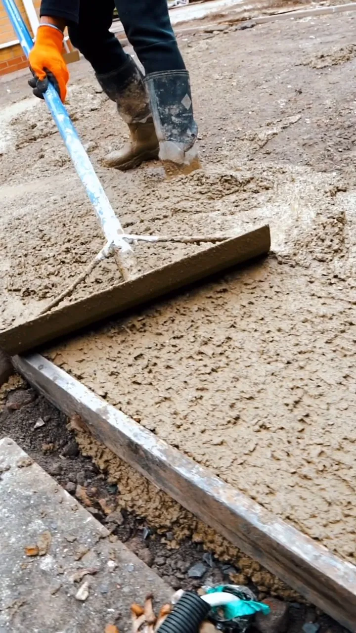 Screeding the concrete in Tydd St Giles