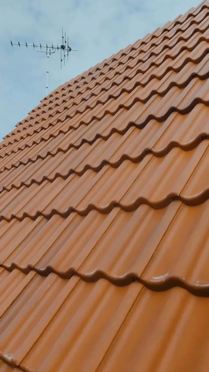 Close-up of Crest Double Pantiles in Rustic Red on the Stamford re-roof