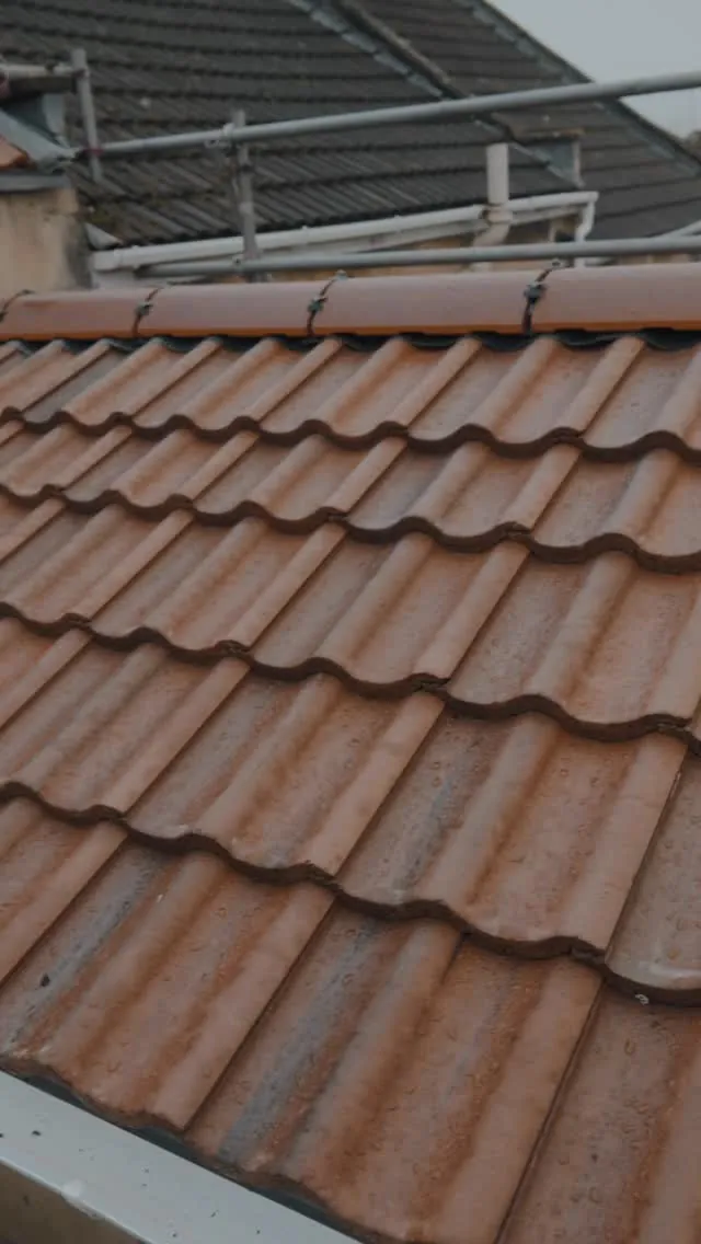 Close-up of Crest Double Roman tiles in Rustic Red in Bath