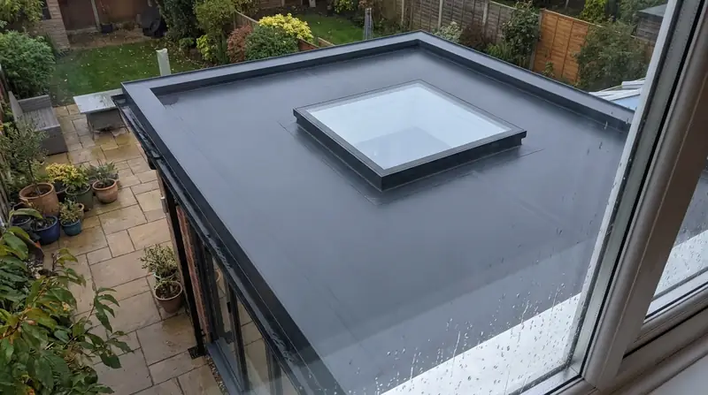 Modern flat roof with rooflight on a UK home extension