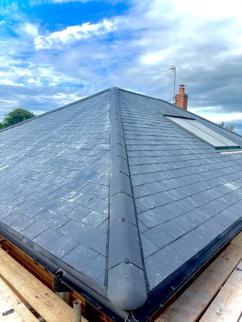 Mechanically fixed hip ridge detail on the Hallaton roof replacement