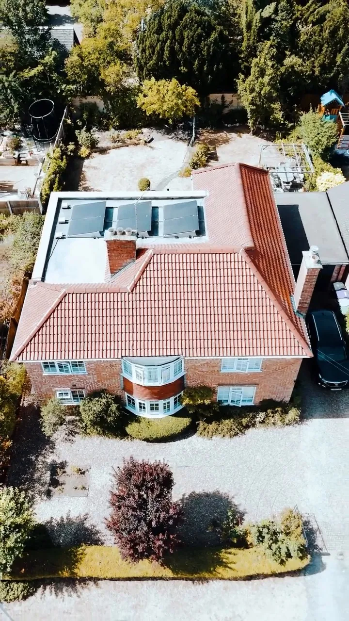Completed red tiled re-roof on a detached home in Stamford