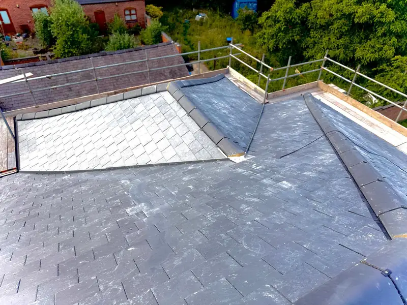 New slate roof planes and hip junctions on the Hallaton reroof
