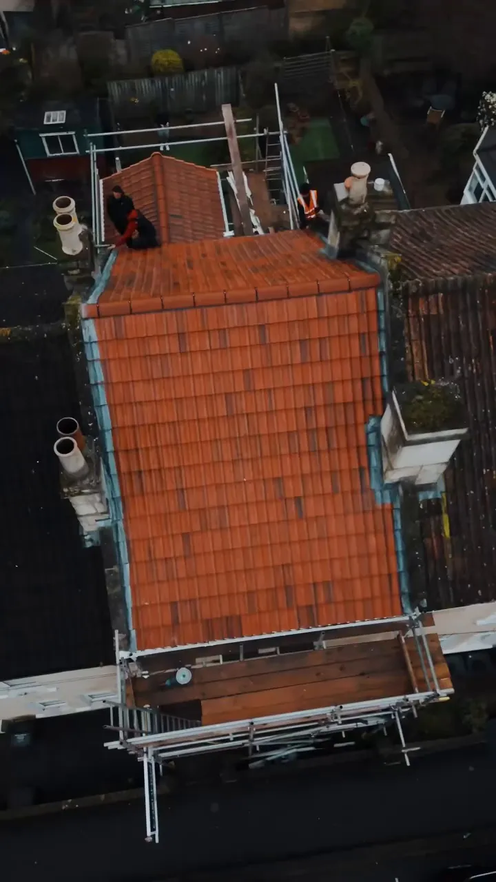 Red tiled re-roof with scaffold in place in Bath