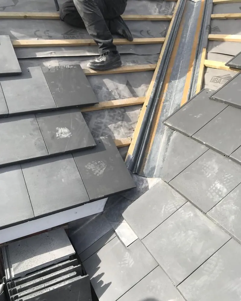 Our roofer laying new slates in Melton Mowbray