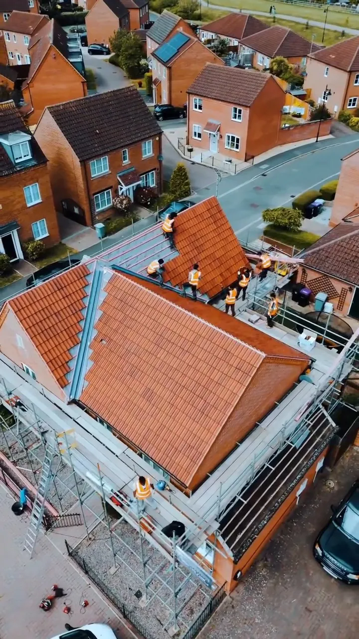 New Rustic Red double pantile roof on a modern home in Stamford