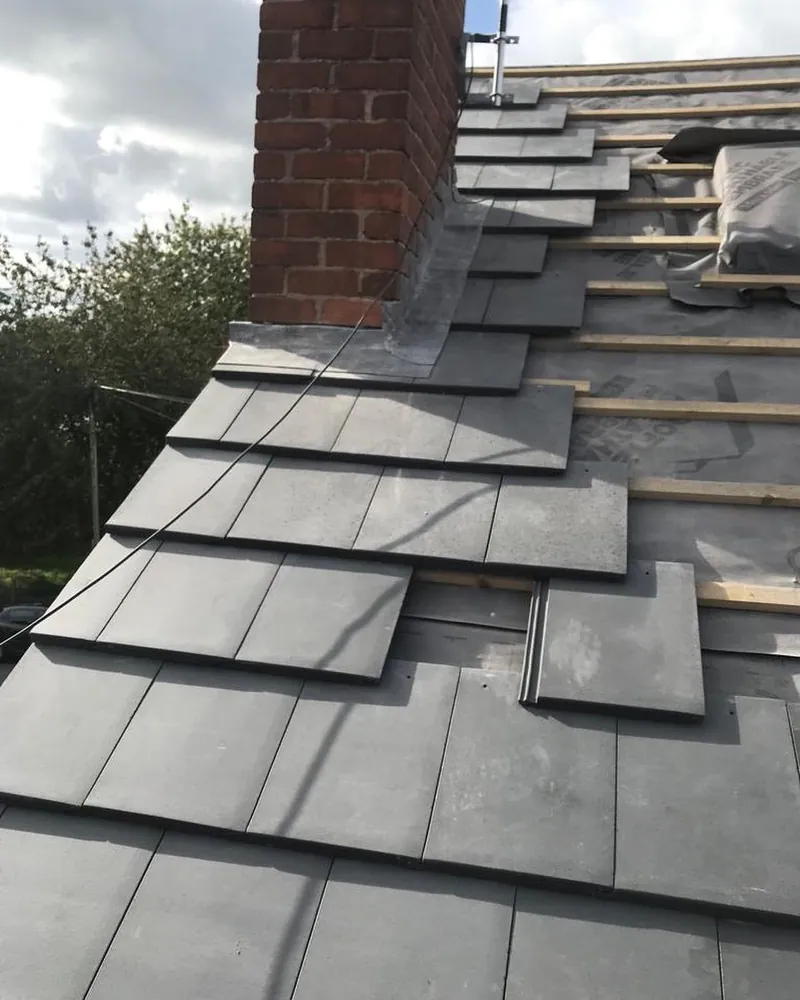 Slating around the chimney in Melton Mowbray